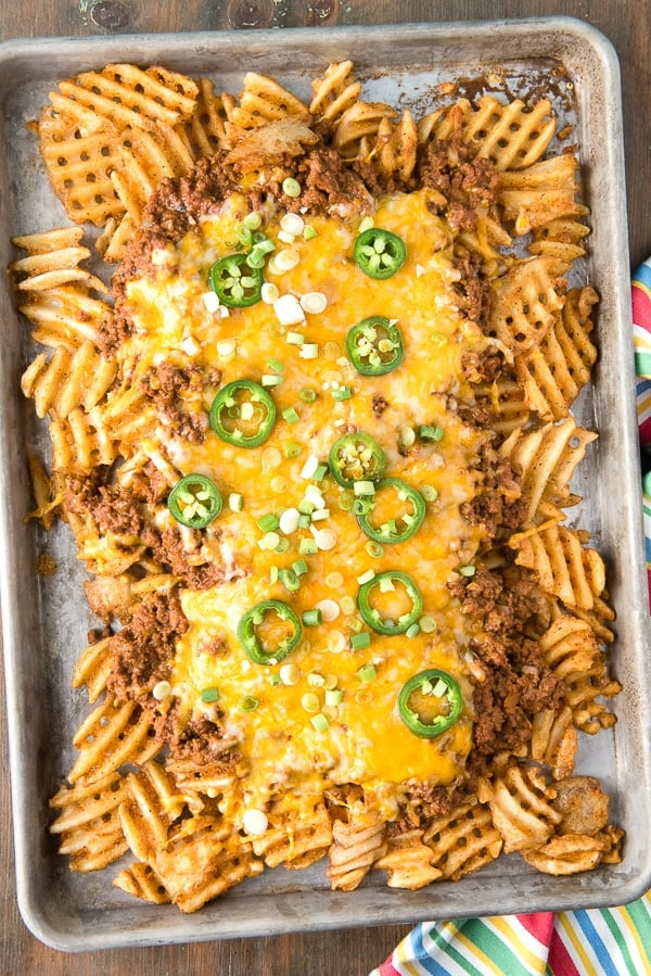 Chili Cheese Waffle Fries on a sheet pan