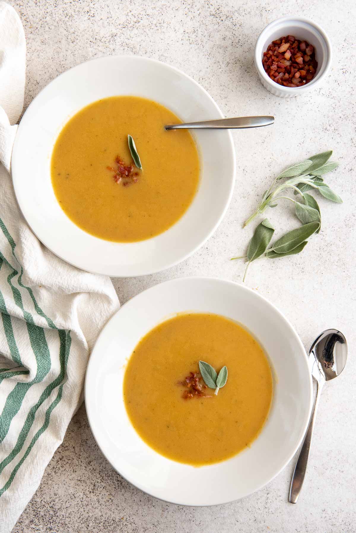 roasted pumpkin cannellini soup in two bowls