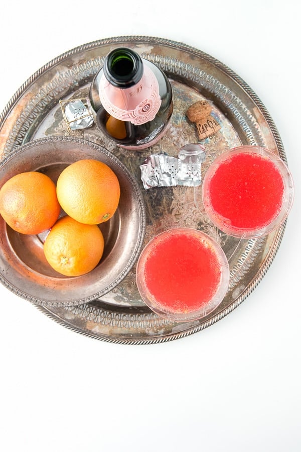 Blood Orange Mimosas with Brut Rose Sparkling Wine on tray