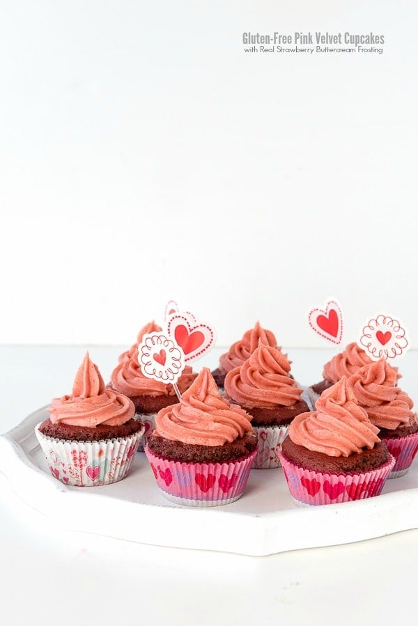titled image - Gluten-Free Pink Velvet Cupcakes with Real Strawberry Buttercream Frosting baked in Valentine's Day cupcake wrappers