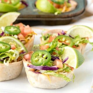 A plate of food on a table, with Taco and Muffin