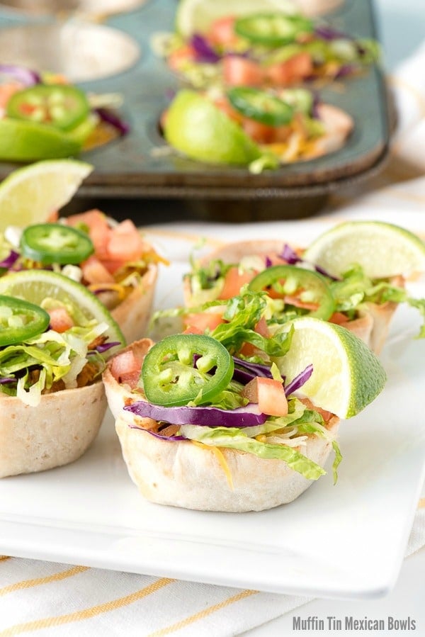 A plate of food on a table, with Taco and Muffin