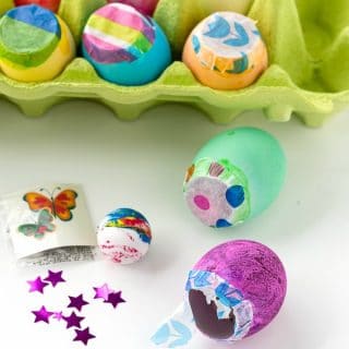 Toy-Filled Cascarones or Confetti Eggs in an egg carton with trinkets for filling eggs