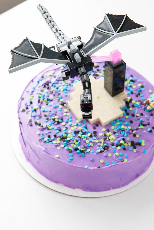 overhead image of a purple frosted Gluten-Free Funfetti Minecraft Cake