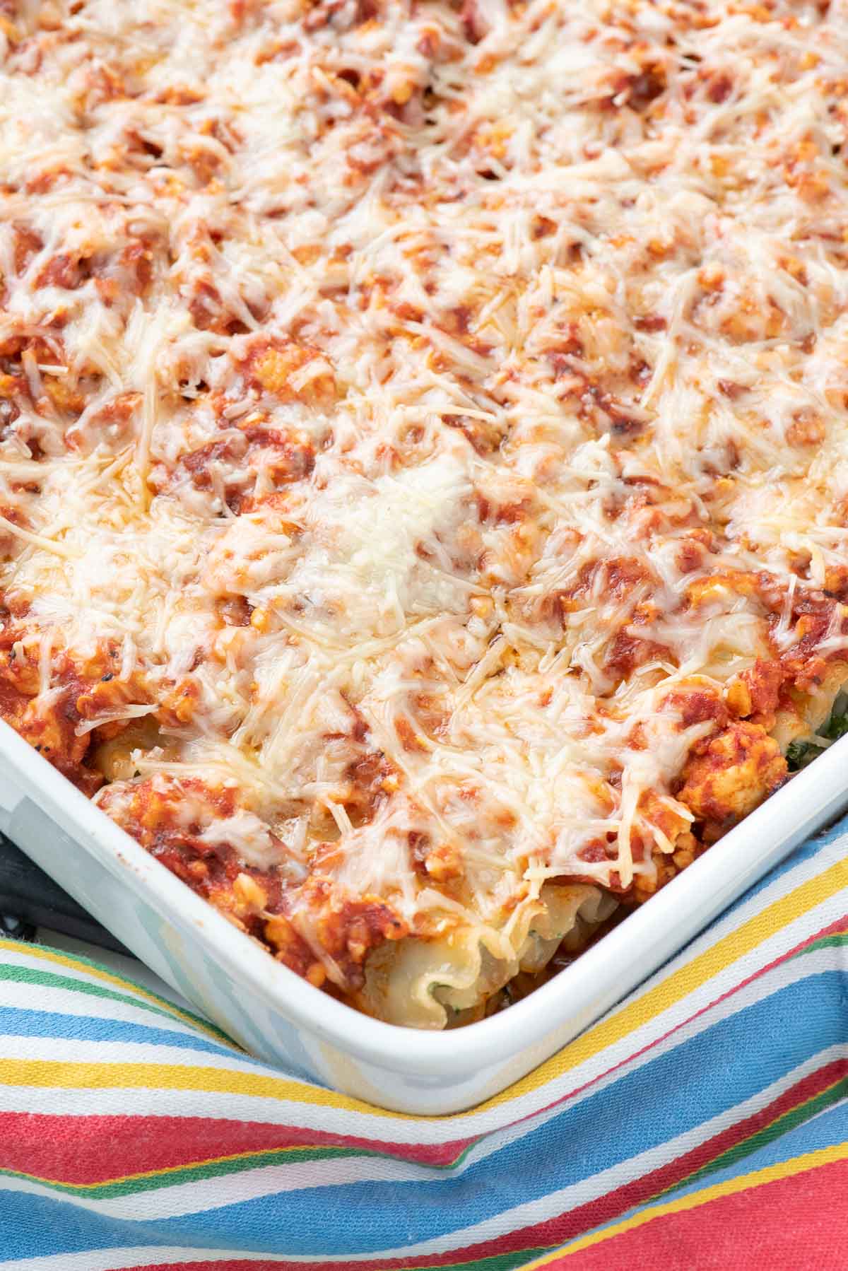 lasagna roll ups in baking dish.