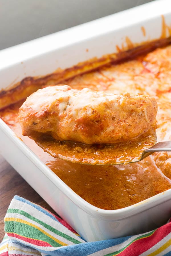 Oven Baked Chicken Breasts in cheesy enchilada sauce