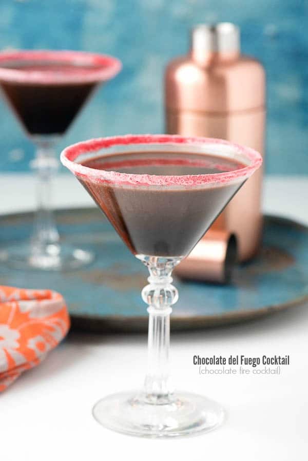 Chocolate del Fuego - creamy chocolate cocktail in a glass rimmed with crushed cinnamon candies