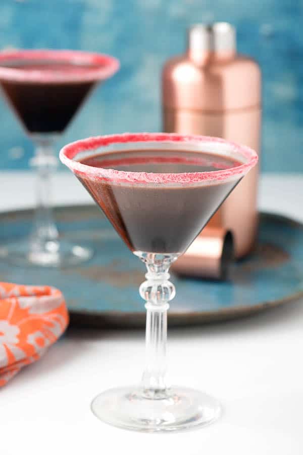 Chocolate Martini in cocktail glass rimmed with cinnamon red hots sugar