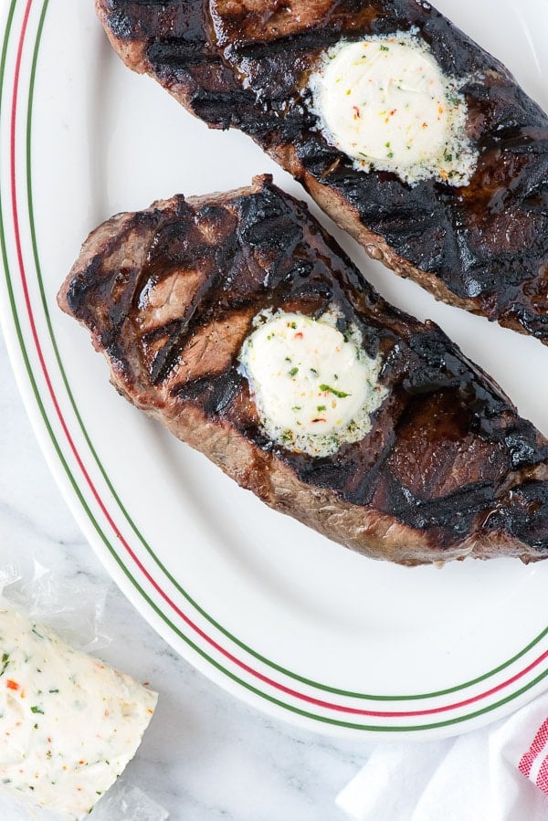 overhead image of Compound Butter melting on top of grilled steaks