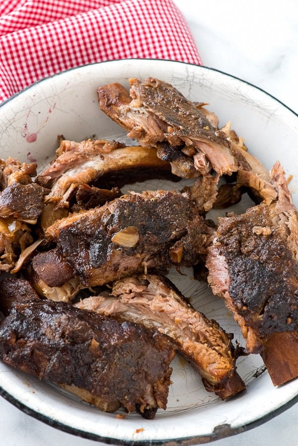 bowl of Spicy Cherry-Cola Baby Back Ribs made in a slow cooker