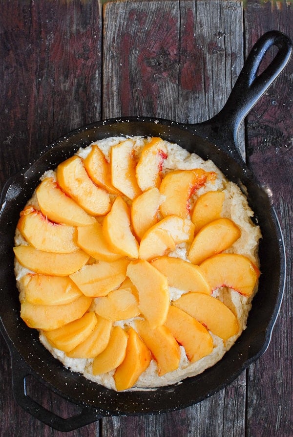 making  Buttermilk Peach Buckle in a cast iron skillet