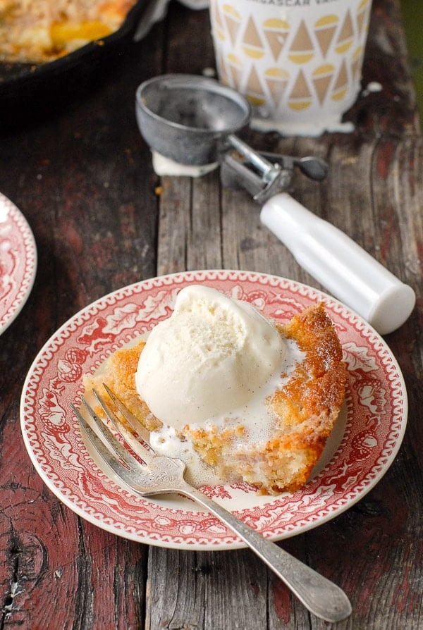 serving of  Buttermilk Peach Buckle with ice cream