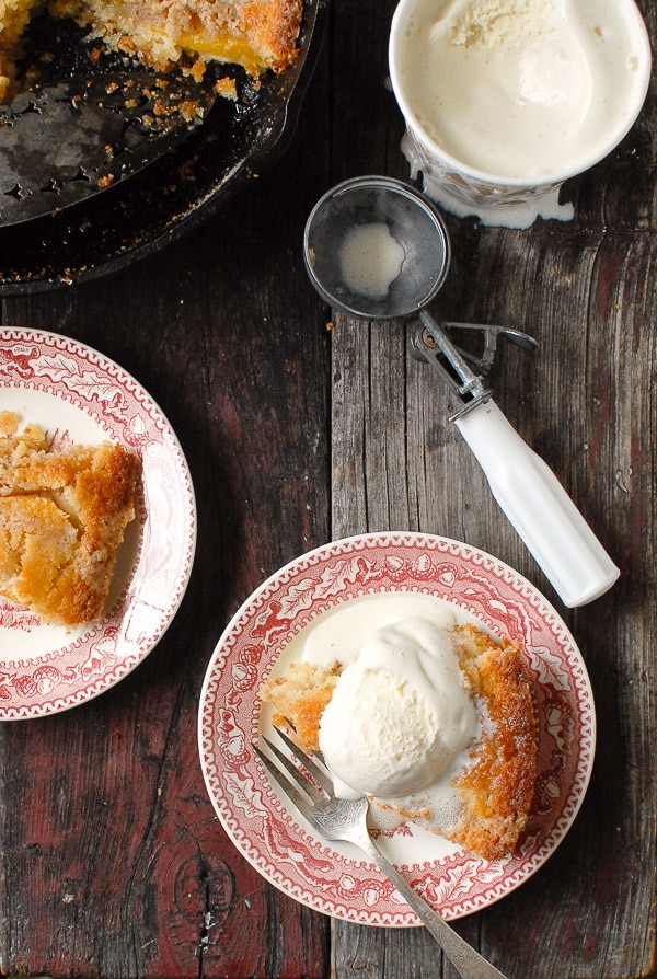 servings of  Buttermilk Peach Buckle with vanilla ice cream