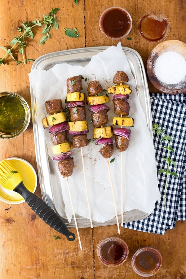 Grilled Cheesy Sausage Pineapple Skewers On platter