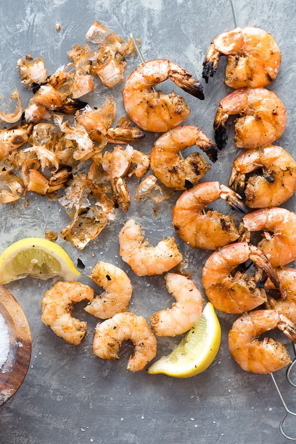 Grilled Spicy Salt and Pepper Shrimp Skewers with some unpeeled grilled shrimp