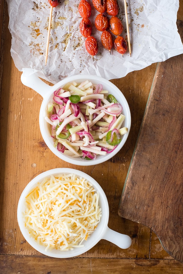 Pickled Broccoli Stem Slaw and Blistered Tomatoes. 