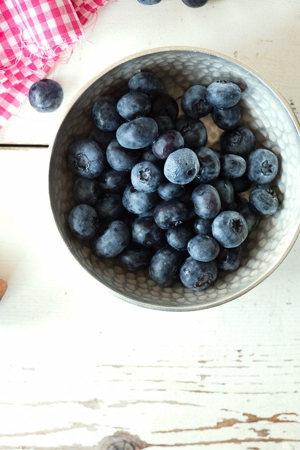 hammered silver bowl of blueberries