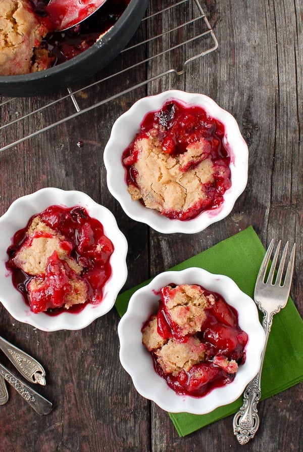 servings of plum slump dessert in white bowls