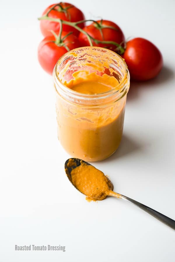 Roasted Tomato Dressing in jar with spoon