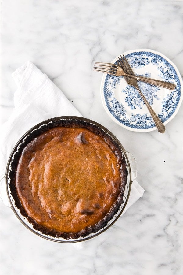 grilled pumpkin pie with plates and forks