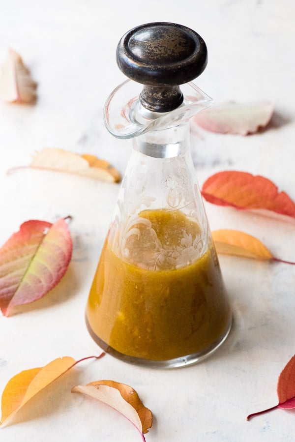 Maple Pumpkin Butter Vinaigrette in a salad dressing carafe