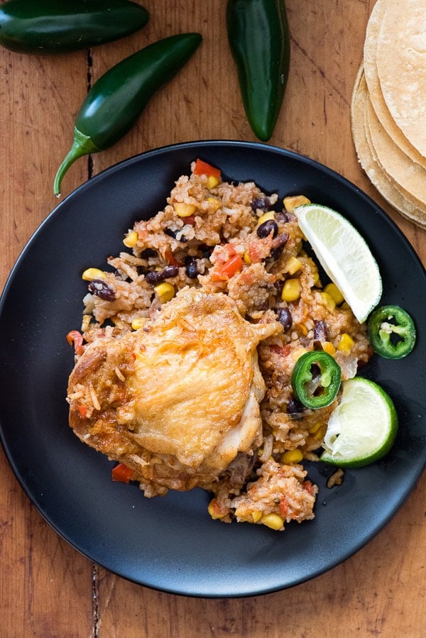 single serving of spicy Mexican Chicken and Rice Skillet on a black plate