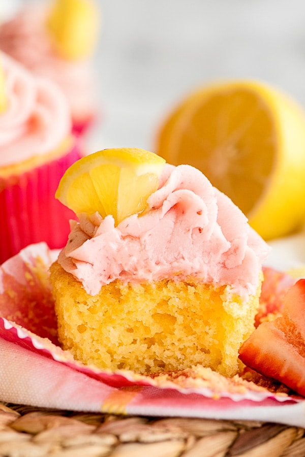 lemon cupcakes with strawberry frosting halved