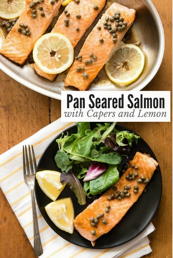 Pan Seared Salmon with Capers and Lemon in a pan and on a black plate