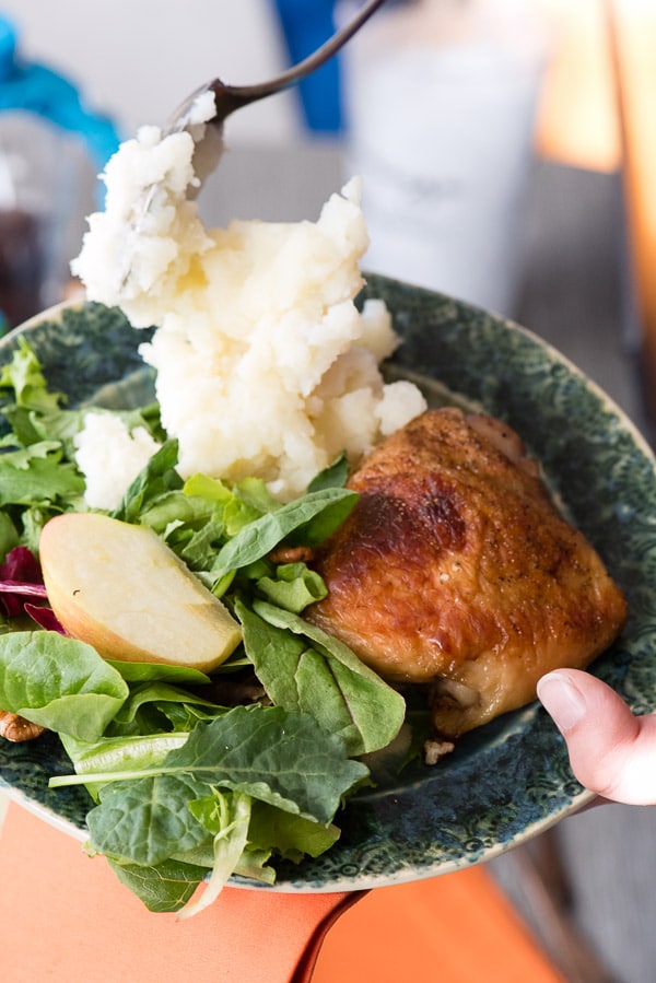 plate of side dishes and Roasted Sweet Tea Chicken Thighs