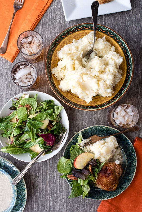 overhead of Roasted Sweet Tea Chicken Thighs mashed potatoes and salad