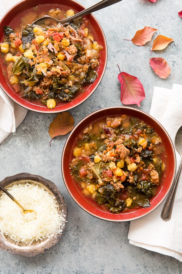 Slow Cooker Chorizo Kale Soup in red bowls