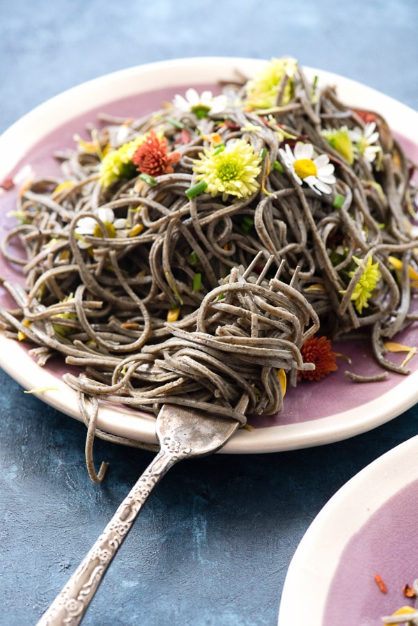 Spicy Brown Butter Garlic Black Bean Pasta on a fork and plate