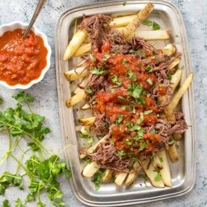 carne asada fries with salsa close up overhead