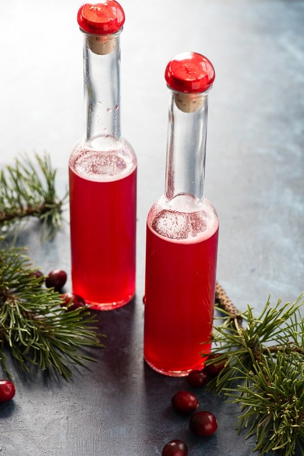 Homemade Cranberry Vinegar In tall bottles