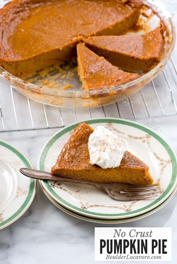 Slice of crustless pumpkin pie on plate with pie in background