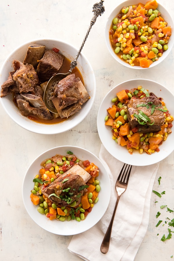 colorful harvest succotash with beef short ribs in bowls