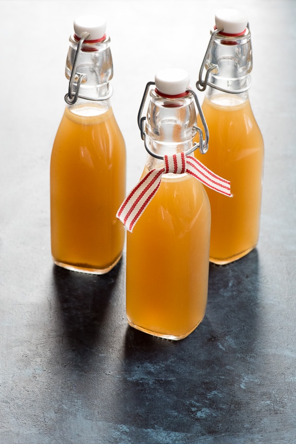 Slow Cooker Homemade Turkey Stock in glass bottles