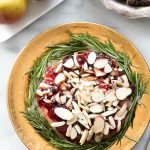 Baked Brie with Cherry Preseves and Almonds. 15 minutes and 3 ingredients to prepare this delicious appetizer! Gluten-free. BoulderLocavore.com