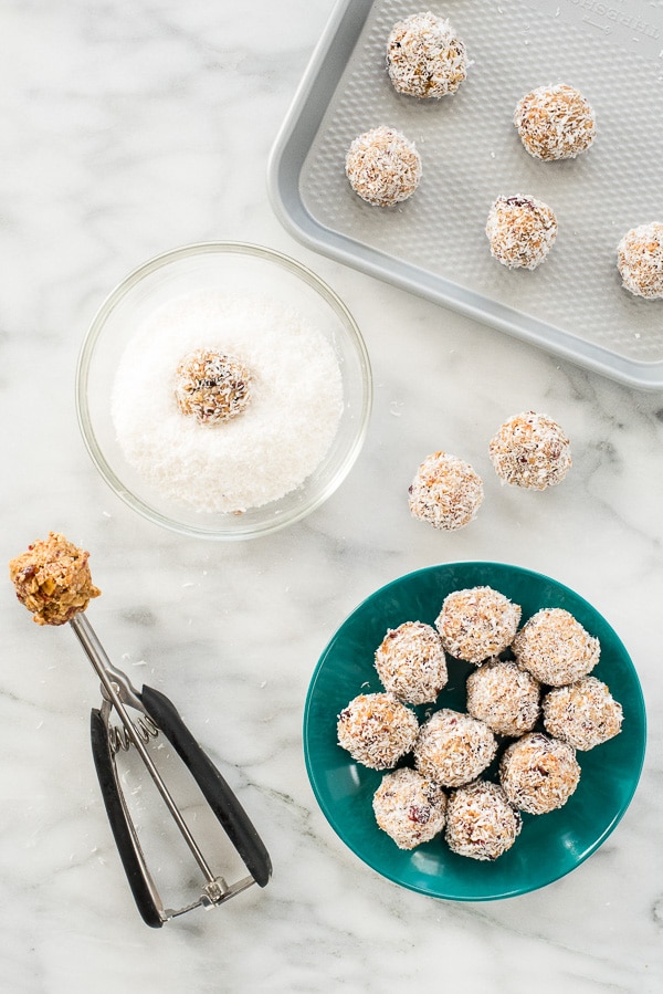 Scooping Coconut Cranberry Granola Energy Bites 