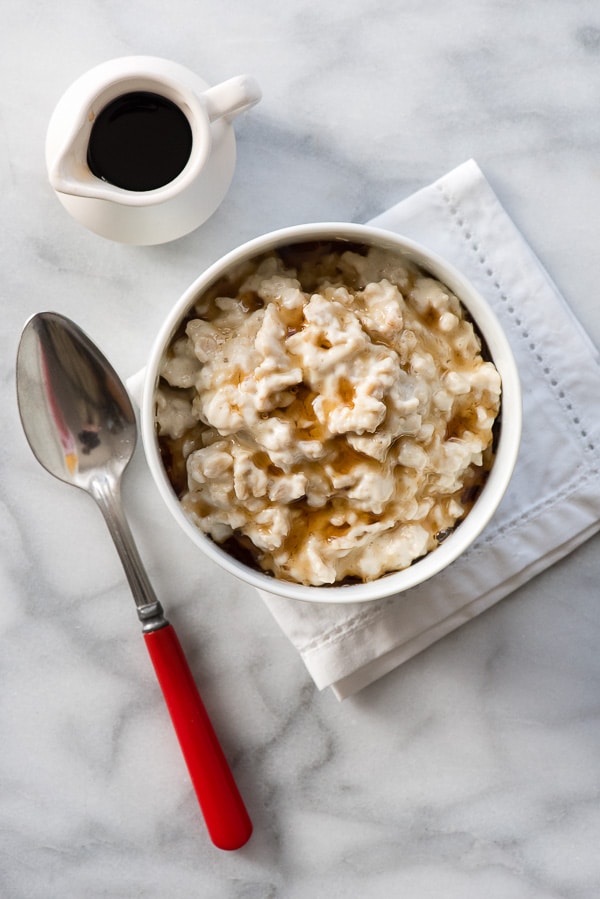 Overnight Oatmeal Pudding with Cherries Drizzled with syrup