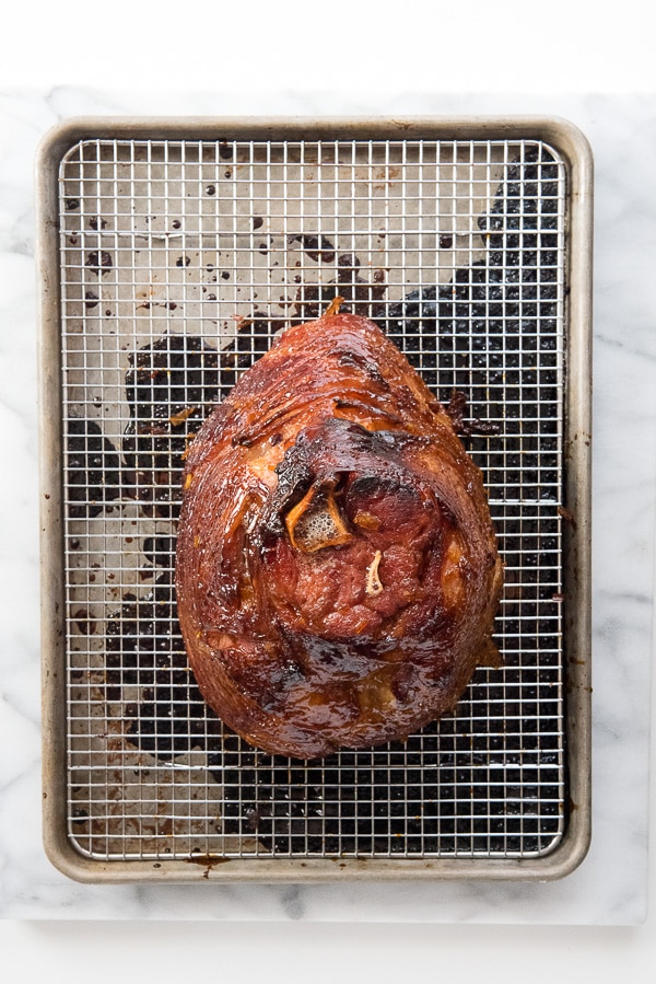 Orange Bourbon Glazed Ham on wire rack