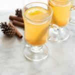 hot mulled apple cider in glass mugs