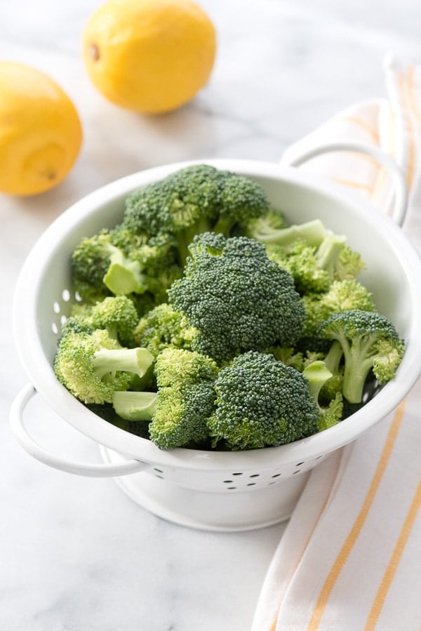 broccoli in white colander