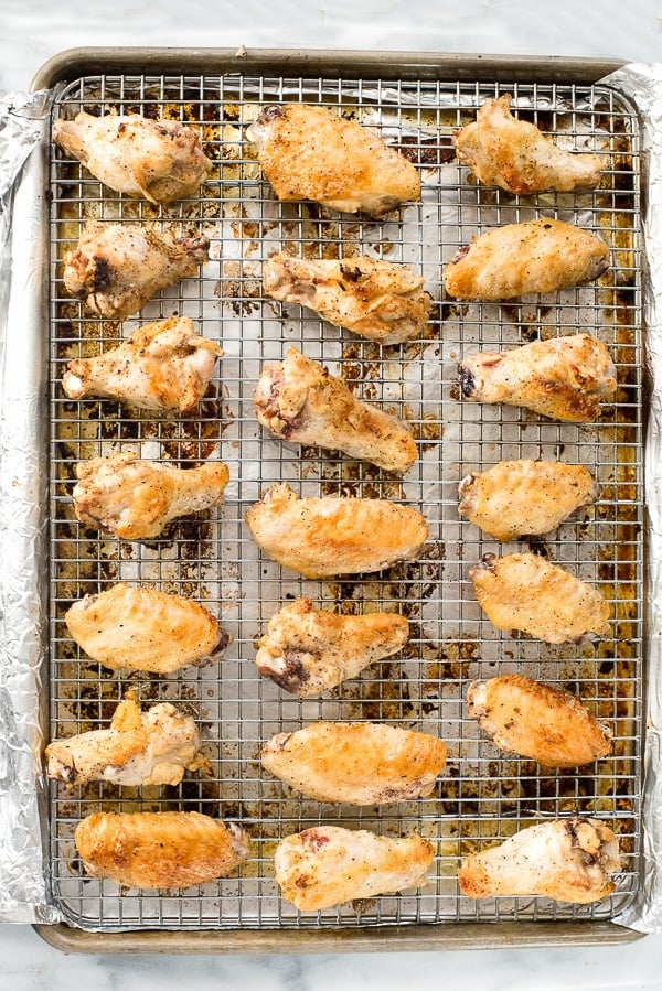 Chicken wings cooked on wire cooking rack