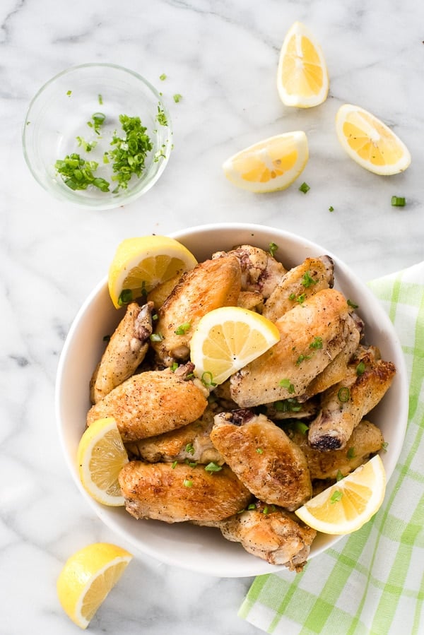 Lemon-Garlic Chicken Wings With lemon wedges