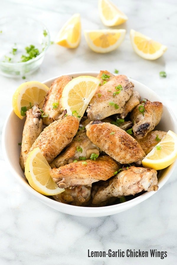 Lemon-Garlic Chicken Wings in a white bowl
