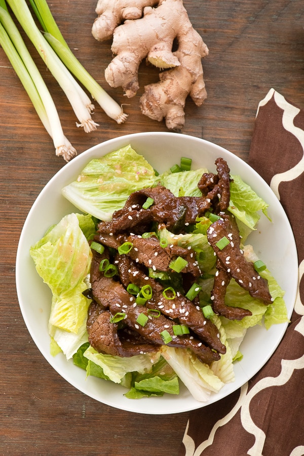 A plate of Mongolian Beef Salad with Ginger Vinaigrette.