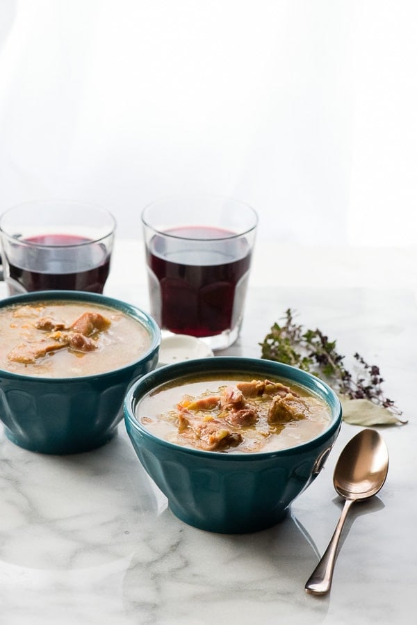 Slow Cooker Split Pea with Ham Soup with glasses of red wine 