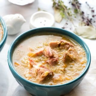 Slow Cooker Split Pea with Ham Soup. This slow cooker soup recipe is easy with great flavor. A perfect way to use holiday ham too! Gluten-free recipe. - BoulderLocavore.com