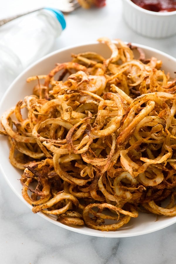 Large bowl of Spicy Baked Curly Fries